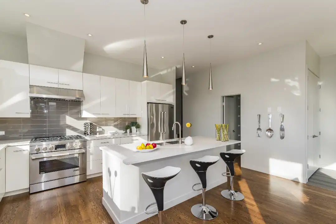 Modern house kitchen with sleek cabinetry and bright lighting